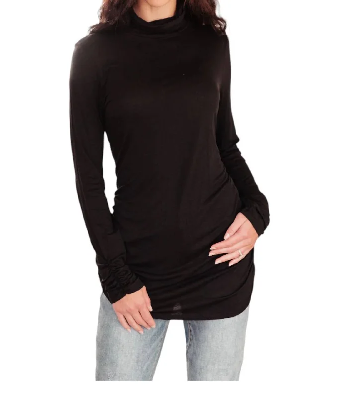 Draped Turtle Neck Tunic In Black